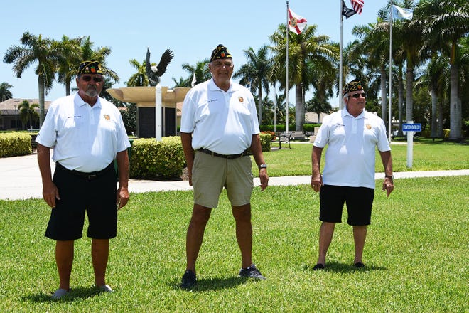 Benny Skeldon, from left, John Apolzan and Lee Rubenstein of the Amercan Legion show where the new statue might be placed. The Marco Island American Legion post proposes to fund and erect a replica of the Vietnam Veterans Memorial "Three Servicemen" statue in Veterans' Community Park.