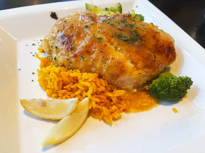 A panko-crusted grouper featuring an orange coconut sauce from Coconut Jack’s Waterfront Grille, Bonita Springs.