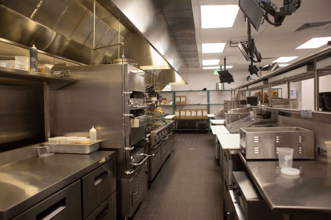 The kitchen at CMX CinéBistro photographed, Monday, Sept. 27, 2021, at the Coastland Center, in Naples, Fla.

CMX CinéBistro is an upscale dining and movie experience and its grand opening is on Oct. 1.