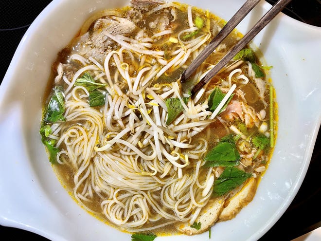 A massive bowl of spicy, rich bun bo hue (pronounced boon bo 'way) from Pho 99 in Fort Myers.