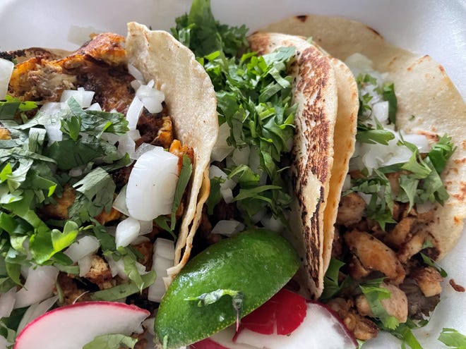 Tacos from Taco Vazquez in San Carlos Park are served with wedges of lime and chunks of radish.