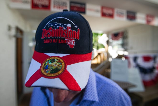 Larry Dyer, North Palm Beach, displays a Ron DeSantis hat during a re-election campaign event for Senator Marco Rubio held at the Sims House on Thursday, October 27, 2022, in Jupiter, FL.