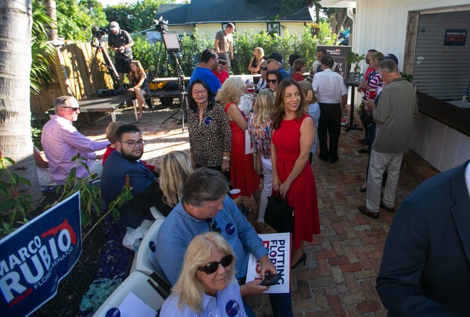 A crowd of Marco Rubio supporters mingle before the start of an event for the Florida senator's re-election campaign held at the Sims House on Thursday, October 27, 2022, in Jupiter, FL.